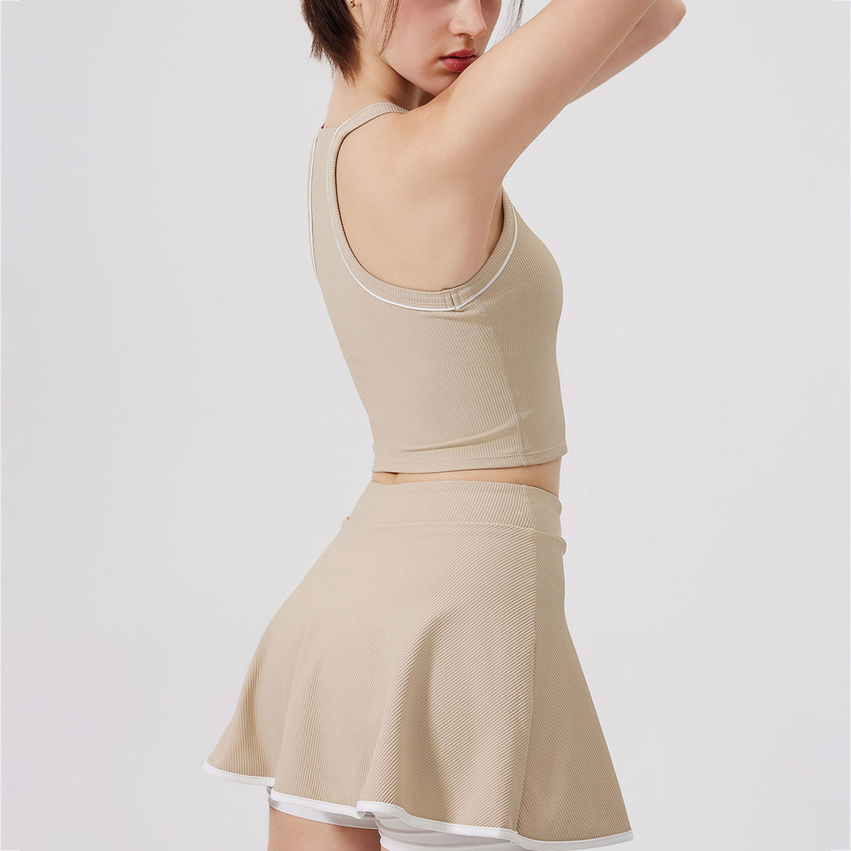 SET ÁO CROPTOP VÀ CHÂN VÁY THỂ THAO